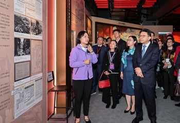 The Secretary for Labour and Welfare, Mr Chris Sun, today (December 10) visited the National Security Exhibition Gallery of the Hong Kong Special Administrative Region with chairmen of social welfare organisations. Photo shows Mr Sun (first right); the Permanent Secretary for Labour and Welfare, Ms Alice Lau (second right); and the Director of Social Welfare, Miss Charmaine Lee (third right), receiving a briefing on the exhibits.