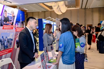 Hong Kong Talent Engage (HKTE) served as an official strategic partner for the second edition of the Hong Kong International Talents Career Expo 2025 held in late June. Photo shows staff members from HKTE providing information to job-seeking talent about settling in Hong Kong.